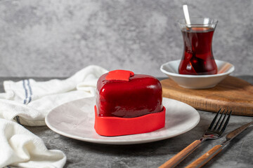 Heart cake. Valentine's day cake on a dark background. Custom made cake for Valentine's Day. close up