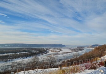 Ice on the Volga River at the Zhiguli gate. winter landscape with snow and trees