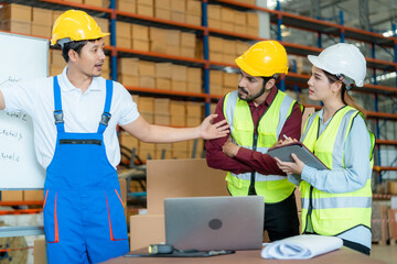 Team meeting in distribution warehouse