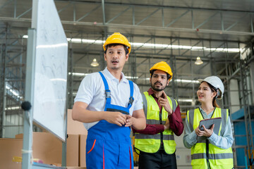 Team meeting in distribution warehouse