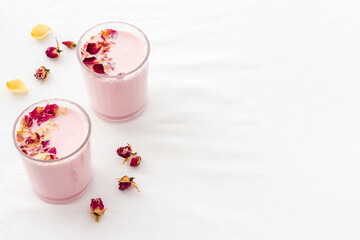 Pink matcha latte coffee or tea with milk, top view