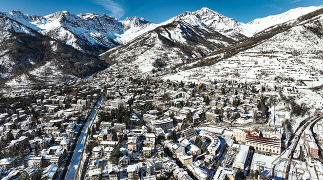 Panoramic view of Bardonecchia village from above, ski resort in the italian western Alps, Piedmont, Italy. Bardonecchia, Italy - January 2023