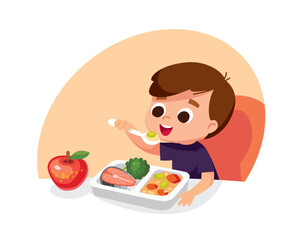 Boy eating healthy eco food with spoon sitting at the table. Child having meal for breakfast, lunch. Boy eats apple for supper, dinner or snack. Hungry kid have a meal. Meals are served to child.