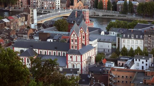 View of the Collegiate Church of Saint Bartholomew and the river in the city of Liege.