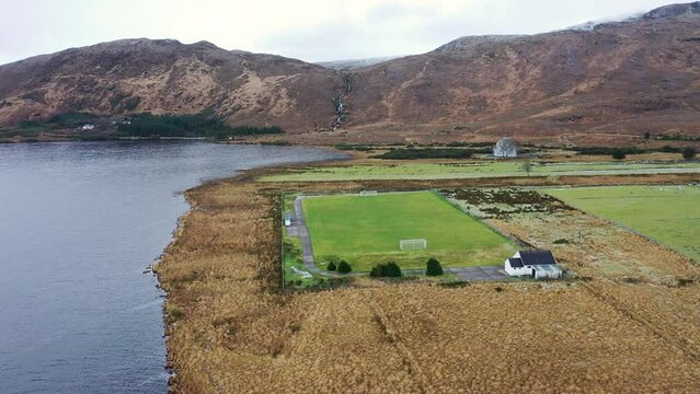 The GAA pitch close to Mount Errigal, the highest mountain in Donegal - Ireland.