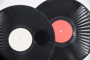 Black vinyl records isolated on white background