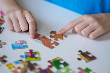 the child collects puzzles