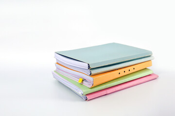 Pile or heap of financial business document paperwork stack on office desk concept of workload overtime or workplace paperless copy