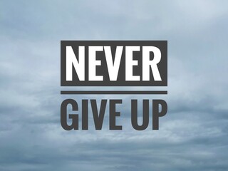 sign for sale Motivational quote with phrase never give up On blurry image background