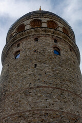 Fototapeta na wymiar Galata Tower, the symbol of Istanbul. Stone historical building built by Genoese.