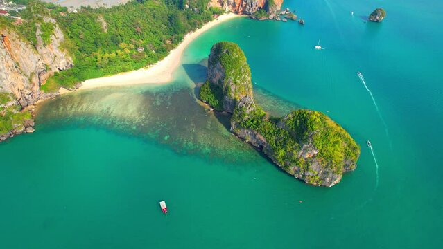 Aerial view over coastal limestone mountains. Thailand. One of the most beautiful tropical seas in the world. Incredible travel destinations on Earth. Travel and Nature concept
