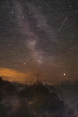 Fototapeta premium Digital painting of the Milky Way over Llanddwyn island lighthouse, Twr Mawr at Ynys Llanddwyn on Anglesey