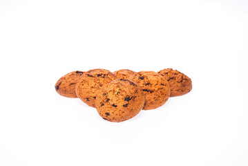 Six oatmeal chocolate chip cookies. On a pure white isolated background. Fresh bakery.