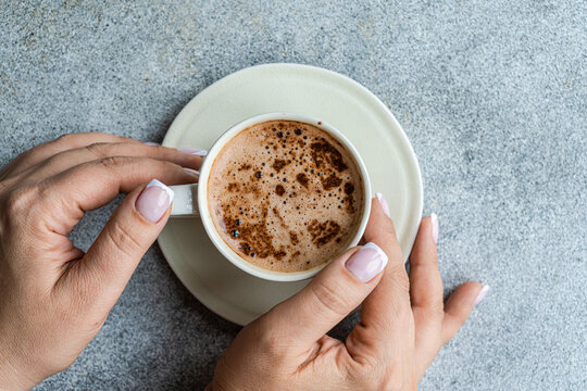 Cup of cappuccino on the table