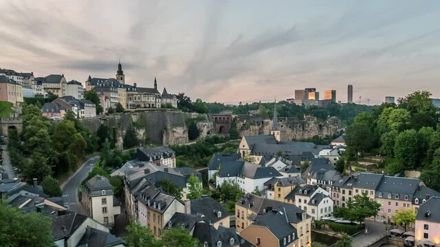 Grand Duchy of Luxembourg time lapse 4K, city skyline day to night timelapse at Grund along Alzette river in the historical old town of Luxembourg