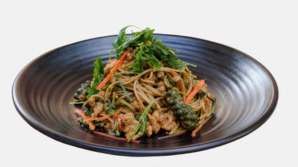 Drunken yakisoba in black plate on White background.
