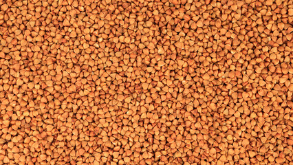 Buckwheat Groats Dry Uncooked Raw Natural Fresh Brown. Roasted buckwheat kernels. Healthy organic food. Background. Top View.