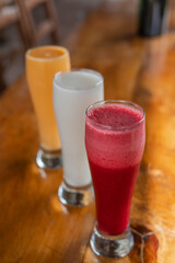 natural fruit juices on a rustic table typical of the region