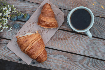 Snack with croissants in nature in the forest