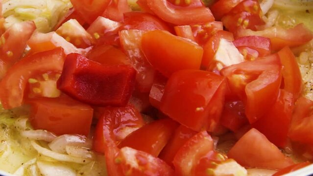 Red spicy sauce with vegetables tomatoes onions carrots