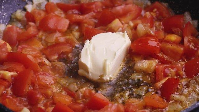 Red spicy sauce with vegetables tomatoes onions carrots