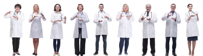Fototapeta premium group of doctors holding jar isolated on white