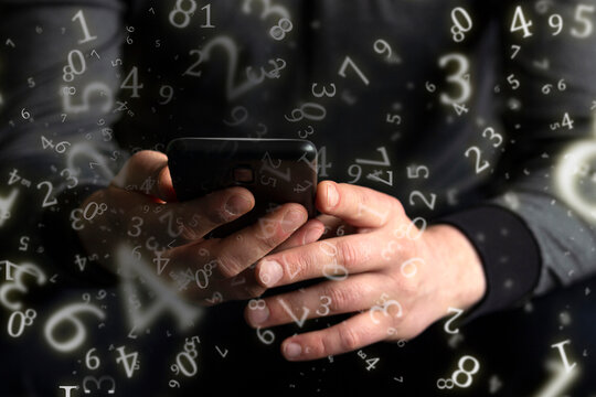 numerology, investment, young businessman using smartphone business, technology and social media concept surrounded by numbers