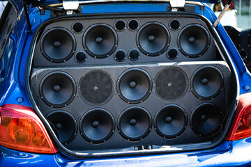 Car trunk full of stereo speakers