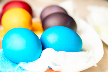 Painted eggs on the table after painting, a symbol of Easter, eggs 
