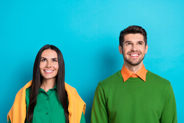 Photo of charming lady bearded man wife husband wear stylish clothes interested look empty space banner isolated on blue color background