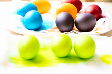 Painted eggs on the table after painting, a symbol of Easter, eggs 
