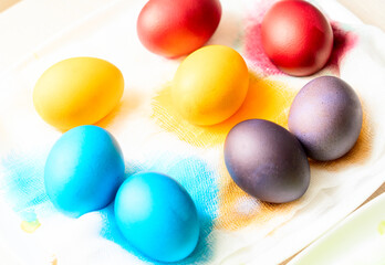 Painted eggs on the table after painting, a symbol of Easter, eggs 