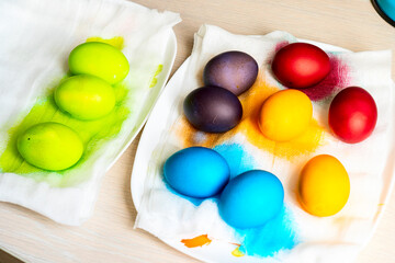 Painted eggs on the table after painting, a symbol of Easter, eggs 