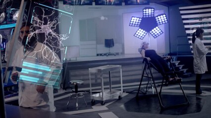 Scientists working on EEG Headset technology with female patient. Scientist analyzes Neuronal Activity on Futuristic Transparent Touchscreen as Doctor views Brain Scan Data on Transparent Tablet. - Powered by Adobe