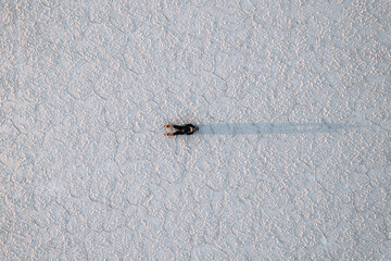 Drone Aerial Photo of person Bolivia Salar de Uyuni Salt Flats