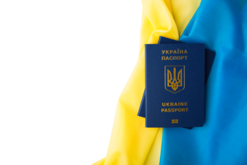 international passport of ukraine against the background of the national flag. war on ukraine