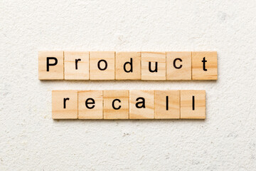 product recall word written on wood block. product recall text on table, concept