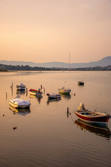 Sunset scene with nets and boat, Kanoni, Corfu, Greece