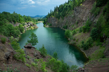 Naklejka na ściany i meble lake in the mountains among the trees