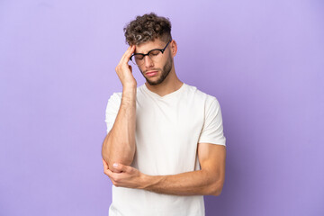 Delivery caucasian man isolated on purple background with headache
