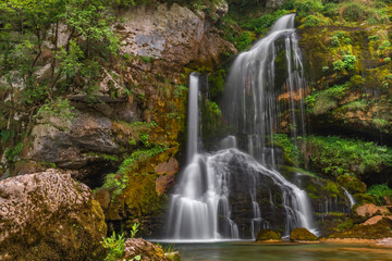 Fototapeta na wymiar Beautiful color summer waterfall Virje in Slovenia Alps