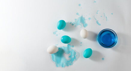 Process of painting Easter eggs with natural dye of blue color. Dyeing Easter eggs