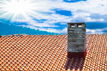 A Chimney on the roof of the house in nature pollution ecology background