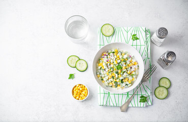 Cucumber corn salad in a bowl