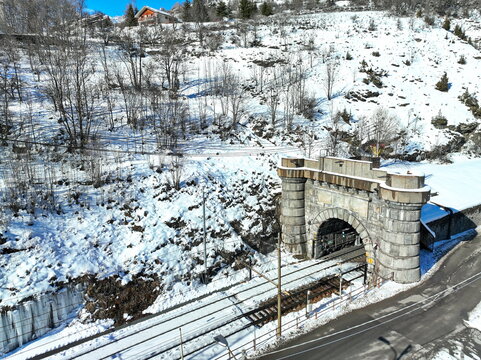 Italian side of the Railway Tunnel on the border between France to Italy. Bardonecchia, Italy - January 2023