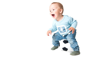 One year old boy playing with the ball, isolated on white background