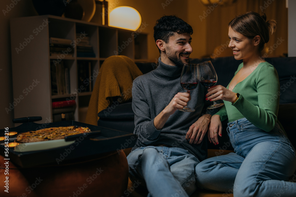 Wall mural young couple celebrating love on valentine's day