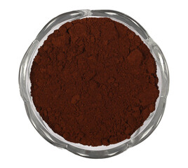 Powdered, instant coffee pile for espresso in glass bowl, isolated on white background, top view