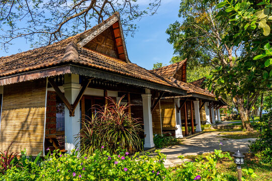 Punnamada Resort, Alappuzha, Kerala, India - 19.01.2023: Beautiful tropical hotel with plants garden. Wooden roof structure. Eco design concept. Hight quality photo