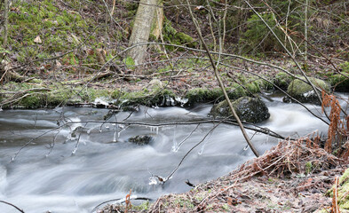Cascade in the wilderness in Finland in winter